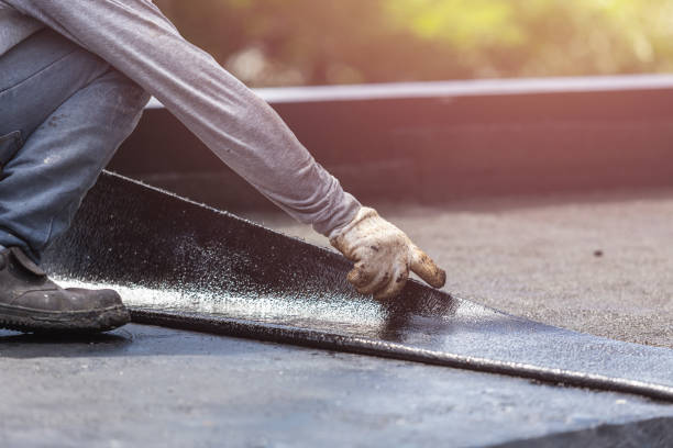 Professional Exterior Waterproofing technician working in Ithaca, NY